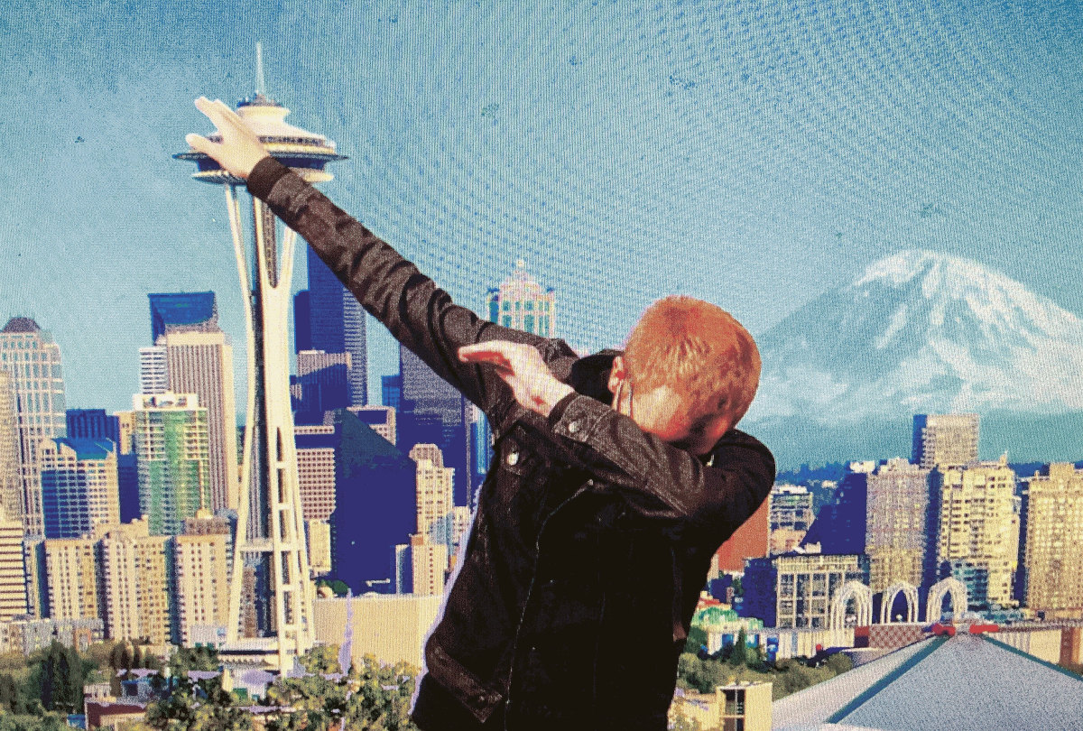 Me dabbing when forced to take a photo by the Seattle tourism folks at the Sky Needle.