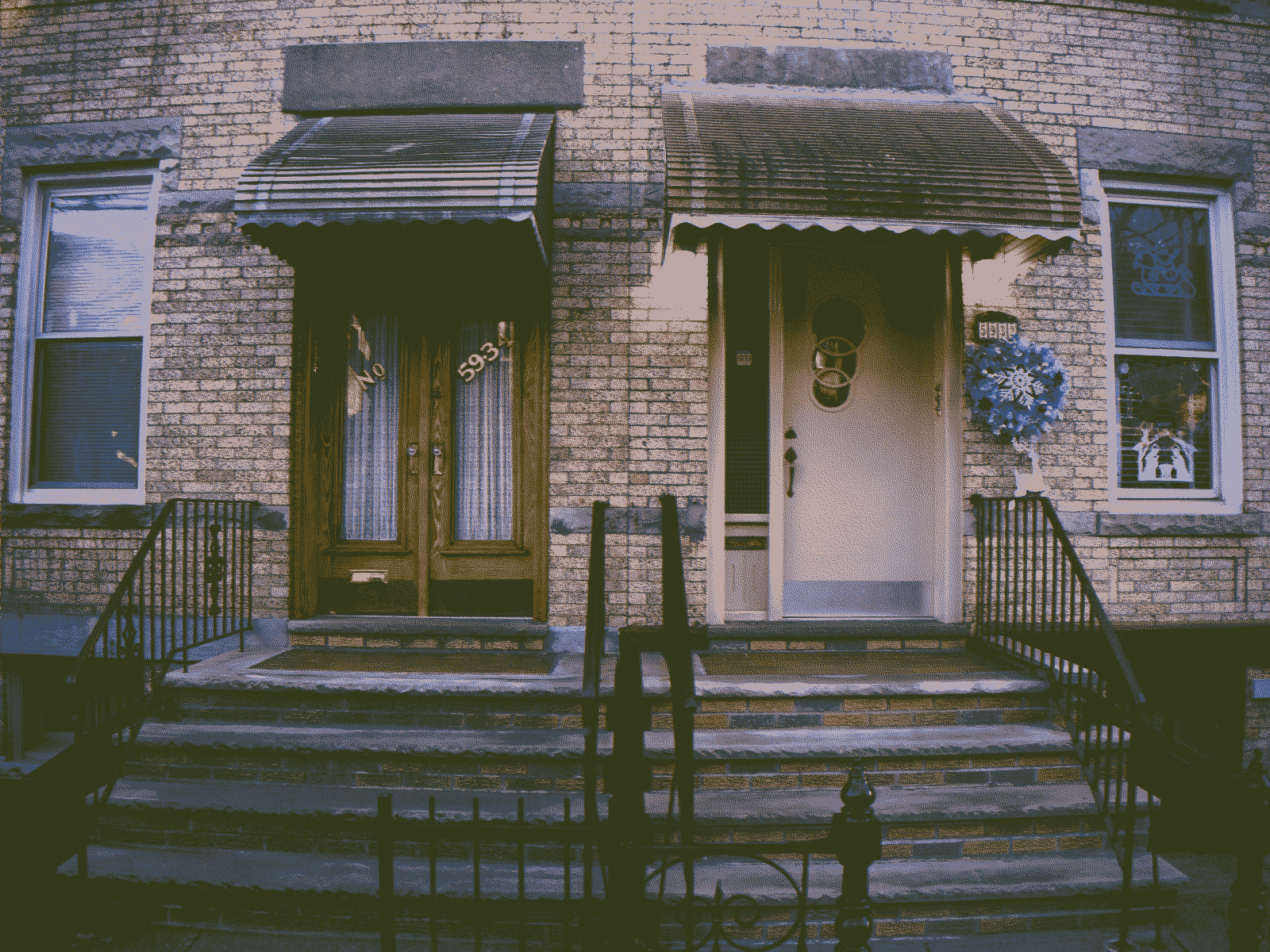 Two particularly nice front doors, right next to each other.